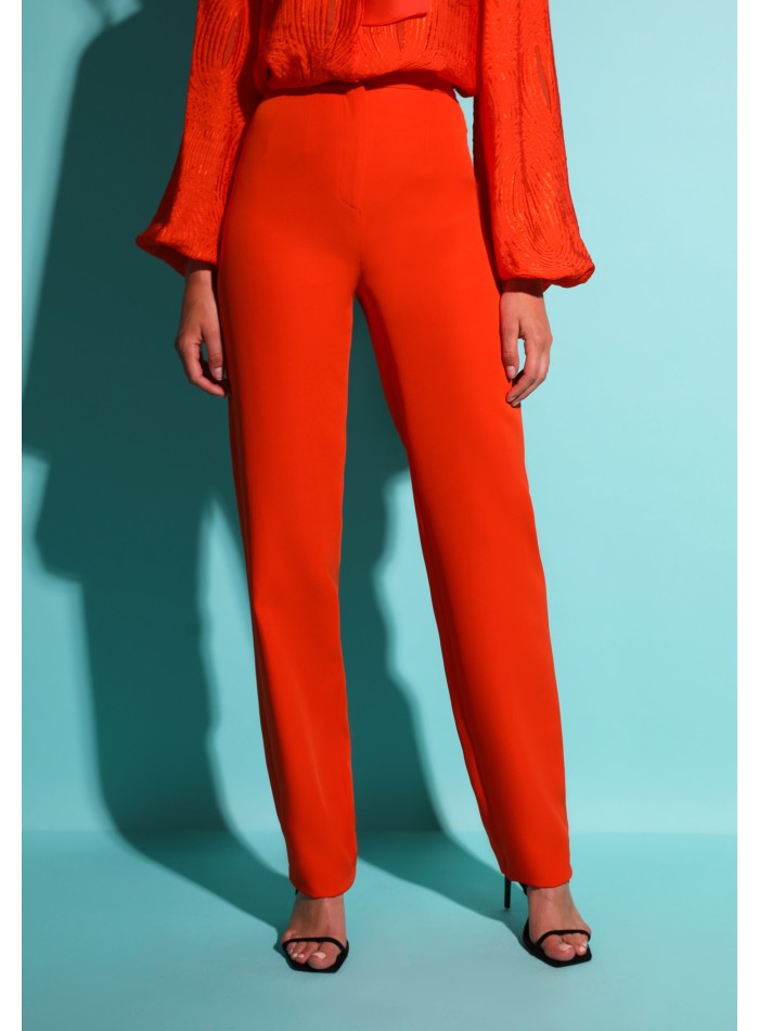 Long orange party pants with straight high rise