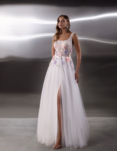 Long white wedding dress with floral embroidered bodice