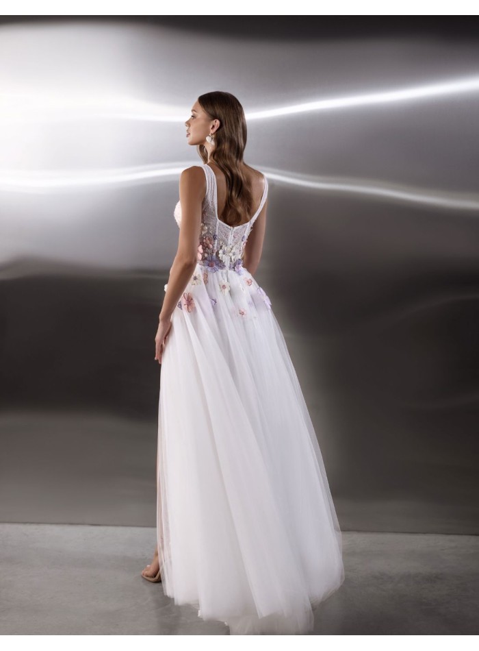 Long white wedding dress with floral...