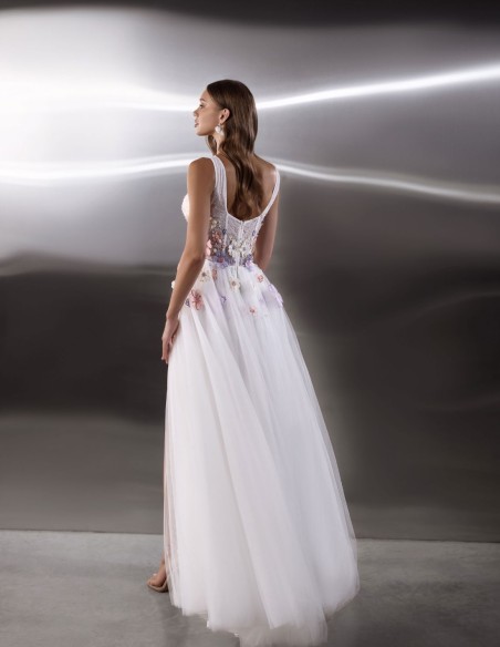 Long white wedding dress with floral embroidered bodice