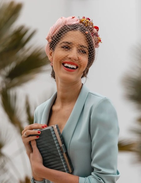 Ruffled party headband with knots and floral side trimming