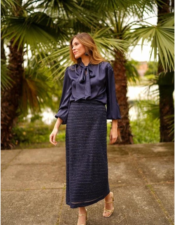 Navy blouse with shoulder pads and V-neckline