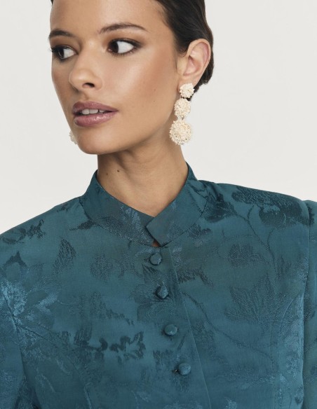 Jacket with stand-up collar and covered buttons