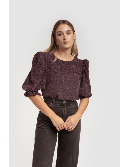 Blusa negra lúrex con mangas abullonadas y detalle de volantes