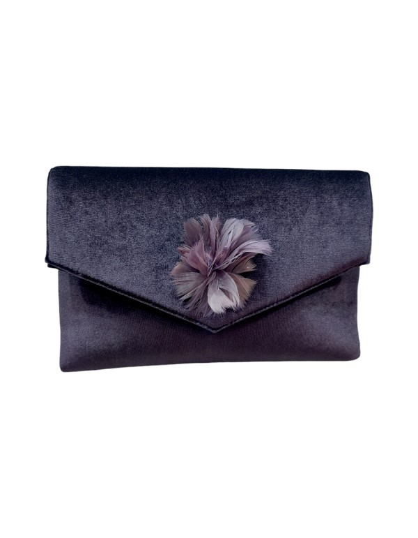 Sac à main en velours violet orné d'une broche