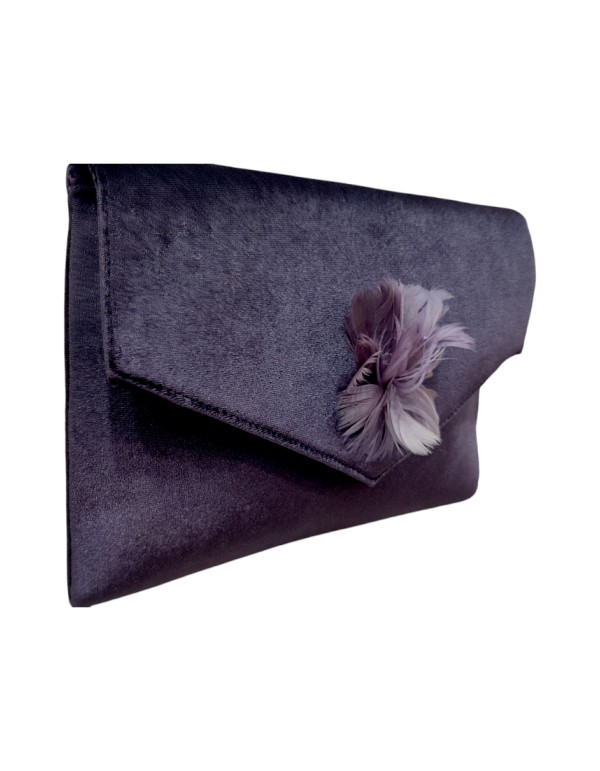 Sac à main en velours violet orné d'une broche 2