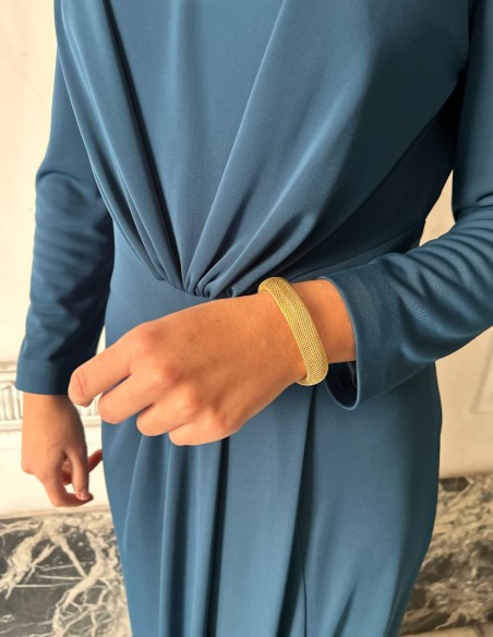 Pulsera de fiesta dorada con textura