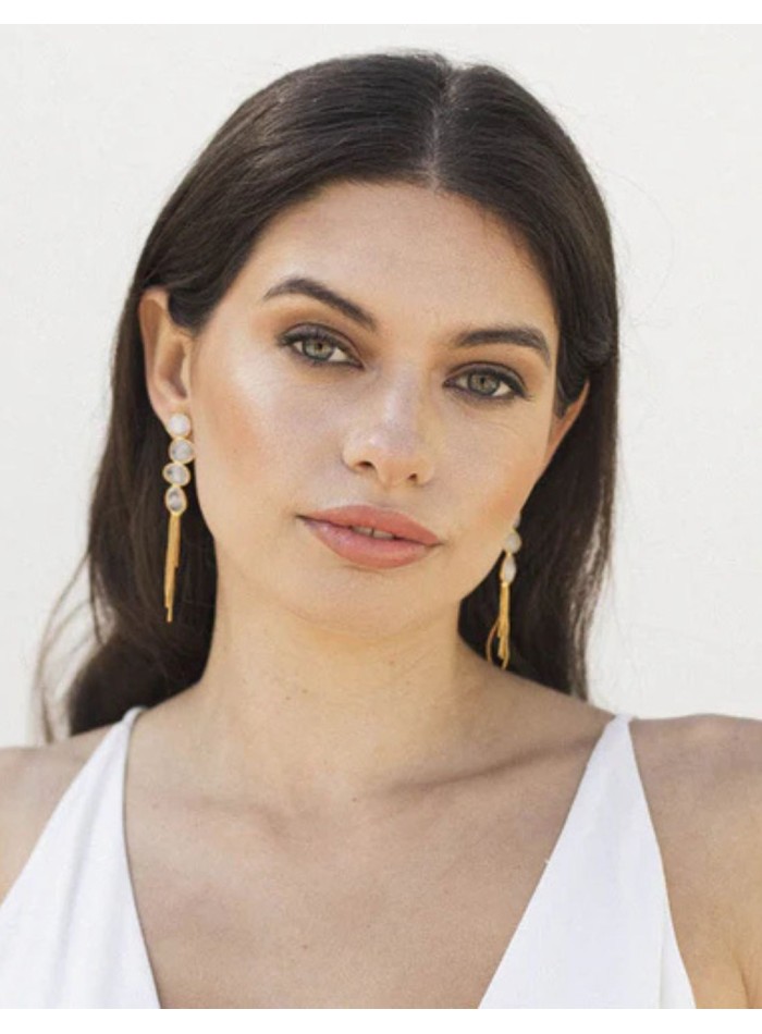 Long gold earrings with moonstone
