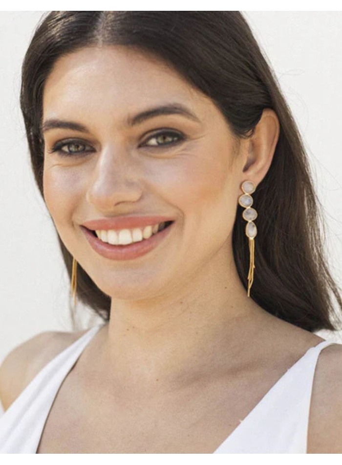 Long gold earrings with moonstone