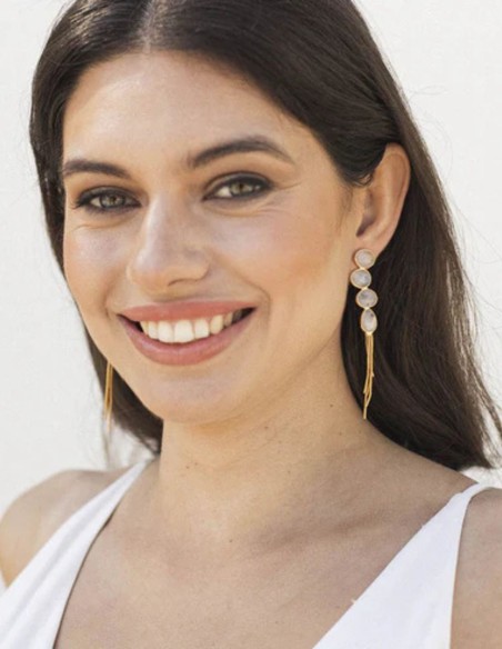 Long gold earrings with moonstone