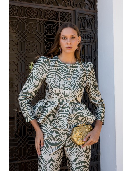 Blusa de fiesta con volante peplum y mangas abullonadas