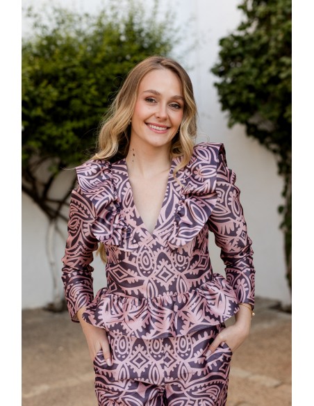 Chemisier imprimé rose à encolure péplum et volants