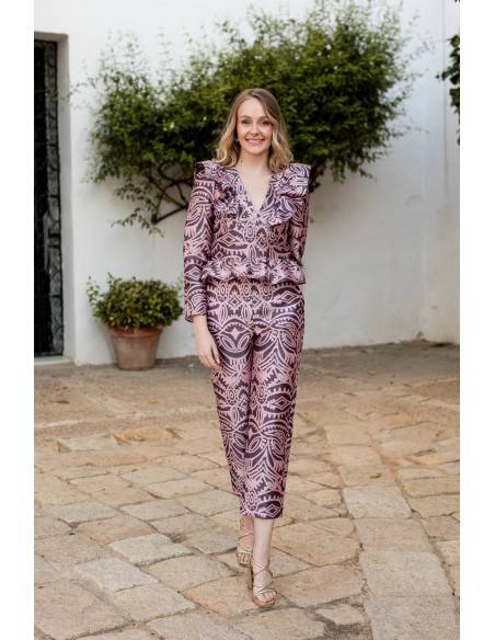 Pink printed blouse with peplum neckline and frill