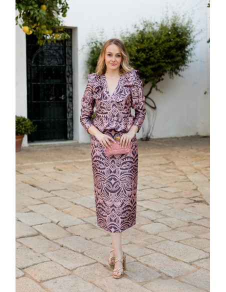 Pink printed blouse with peplum neckline and frill