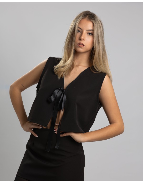 Top de fête noir avec fermeture à nœud