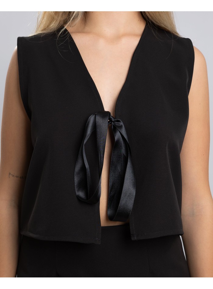 Top de fête noir avec fermeture à nœud