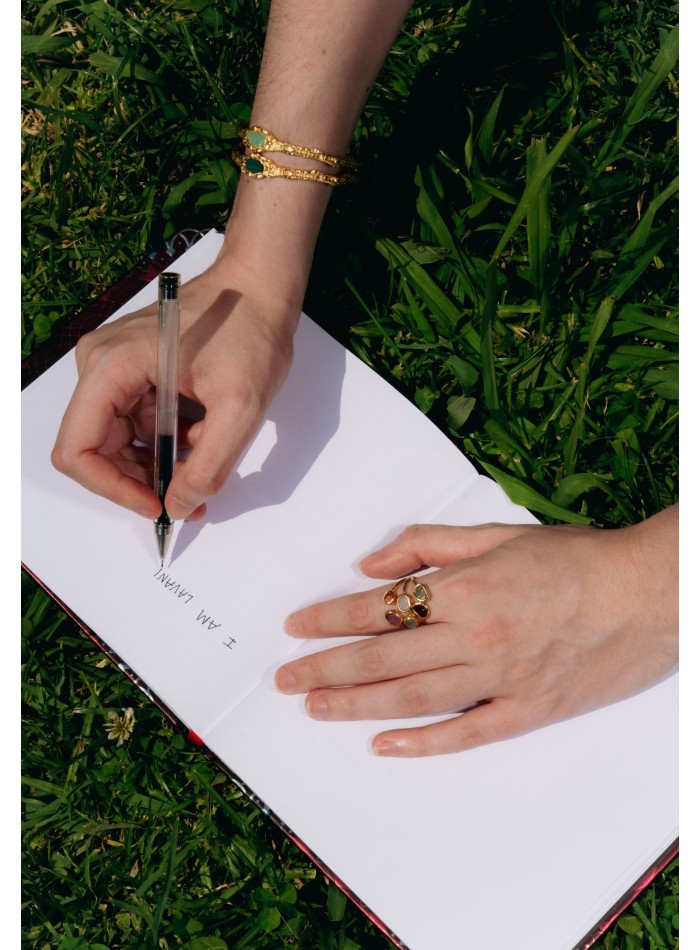 Golden bracelet with aquamarine stone