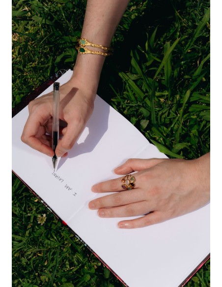 Golden bracelet with aquamarine stone