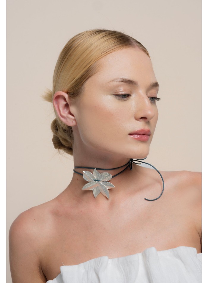 Silver plated necklace in the shape of lotus...