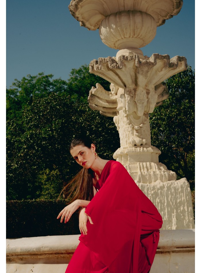 Pendientes dorados forma ojo naranja con piedra