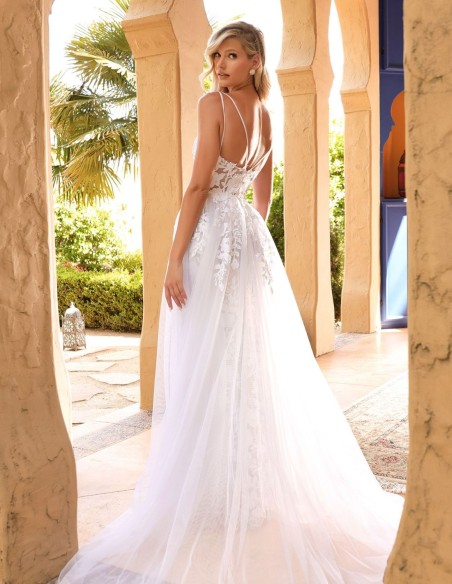 Vestido de novia blanco en encaje con sobrefalda para boda religiosa