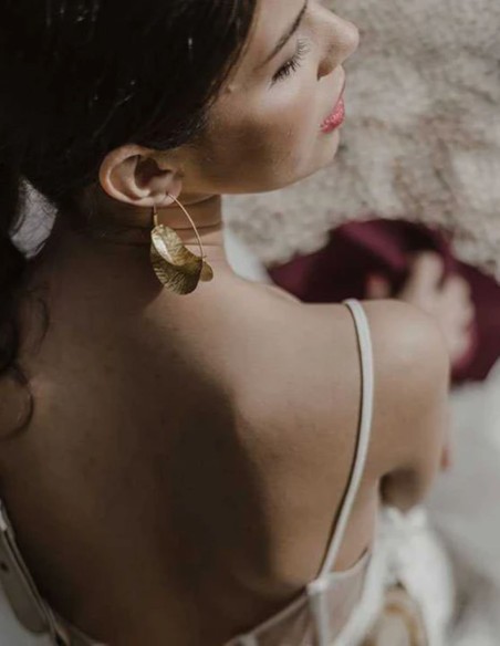 Hoop style party earrings with textured foil pleats