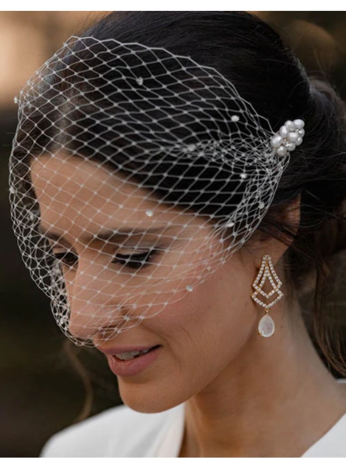 Party earrings with cubic zirconia and white stone