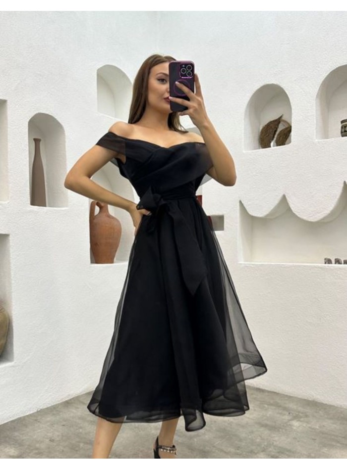 Midi dress with bandeau neckline and bow at the...