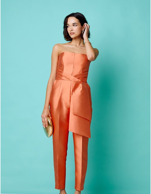 Long peach party jumpsuit with strapless neckline