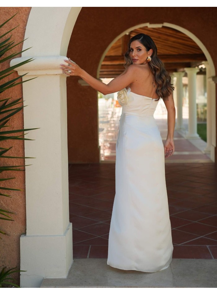 Long white dress with side opening and flower...