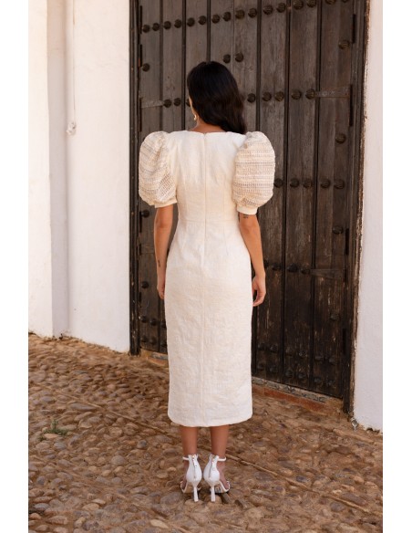 White cocktail dress with short puffed sleeves