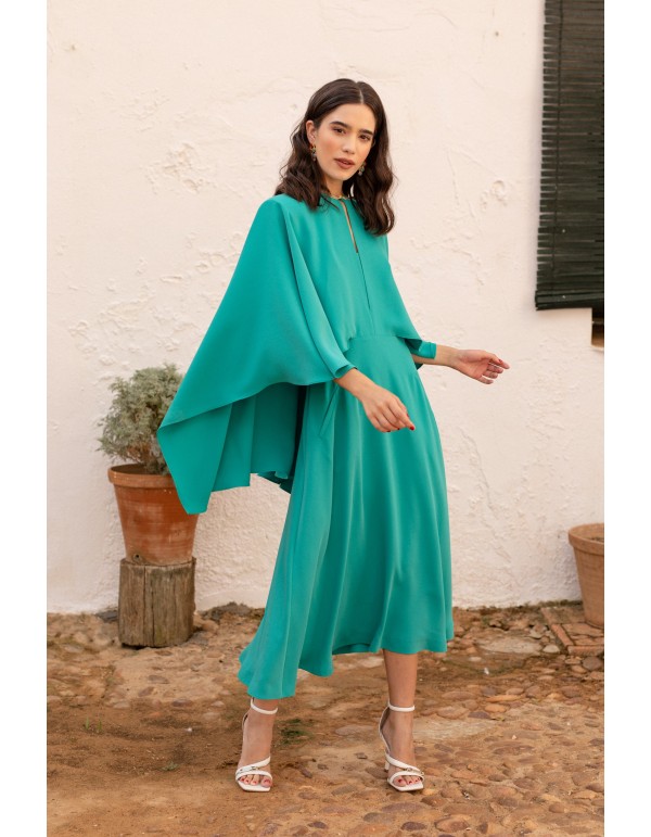 Turquoise midi dress with asymmetrical cape