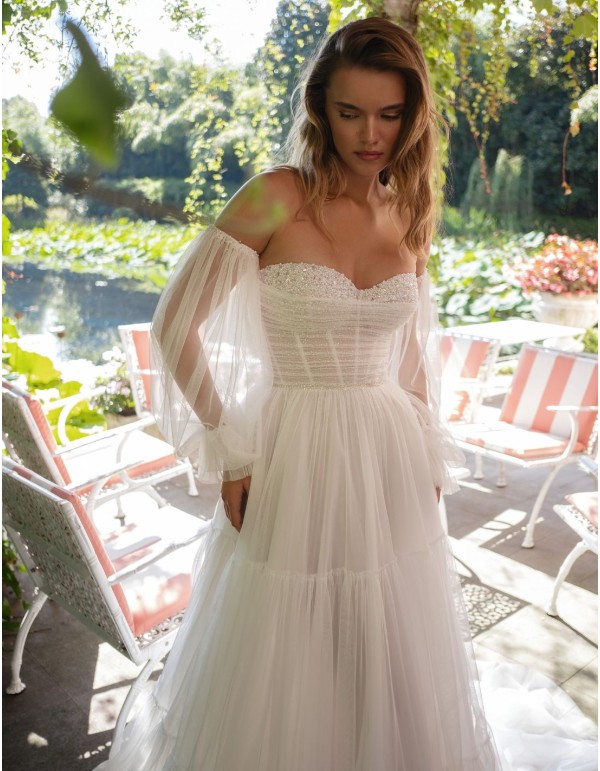 Long wedding dress with corset and long Juliette sleeves