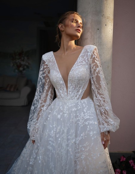 Vestido de novia largo cut-out de encaje con manga abullonada