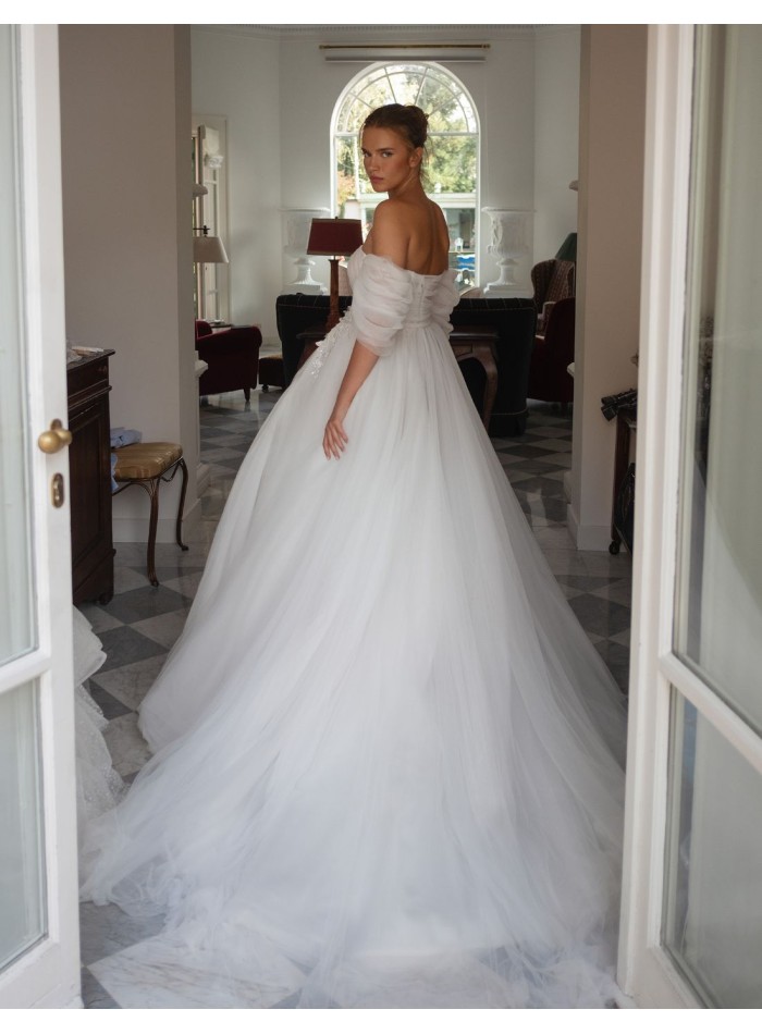 Ivory wedding dress in tulle with strapless...