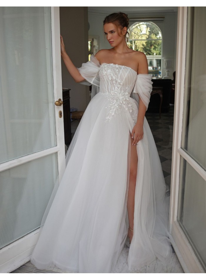 Robe de mariée ivoire en tulle avec décolleté...
