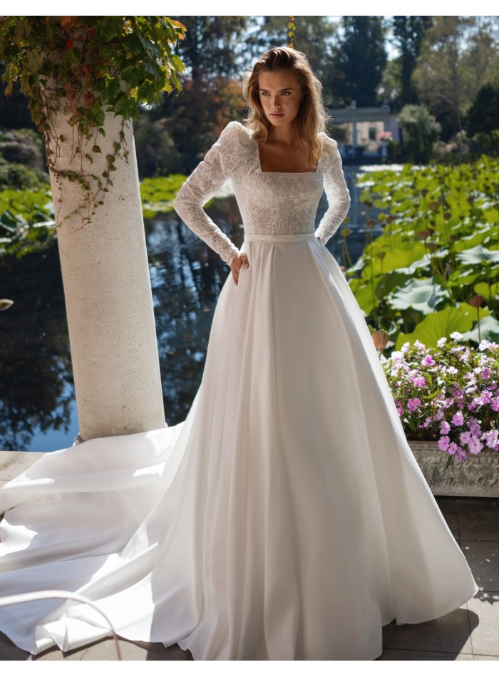 Robe de mariée ivoire avec corsage en dentelle...