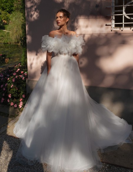 Ivory wedding dress in tulle with sweetheart neckline and elegant bolero
