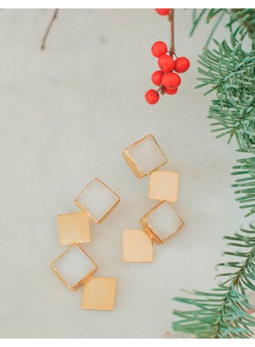 Long golden earrings with white druse stones