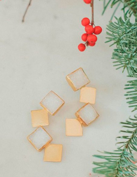 Long golden earrings with white druse stones
