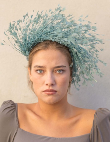 Diadema de plumas naturales azul para invitadas