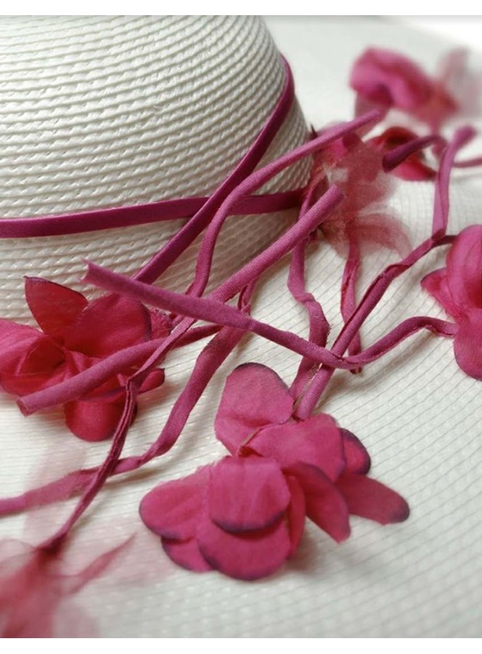 White wide-winged fascinator with bougainvillaea by VintiVintae
