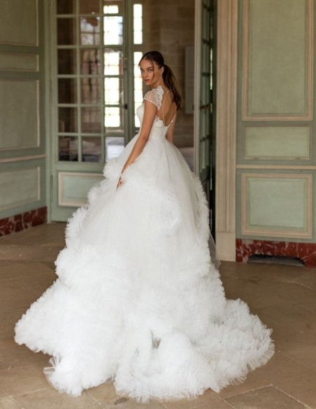 Wedding dress with rhinestone bodice and pompous skirt