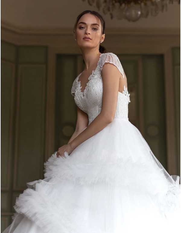 Wedding dress with rhinestone bodice and pompous skirt beautiful
