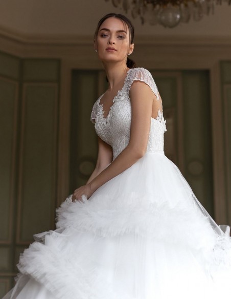Wedding dress with rhinestone bodice and pompous skirt beautiful
