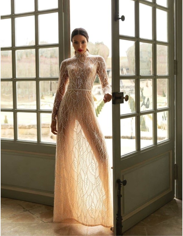 Wedding dress with beaded embroidery and long sleeves from Pollardi