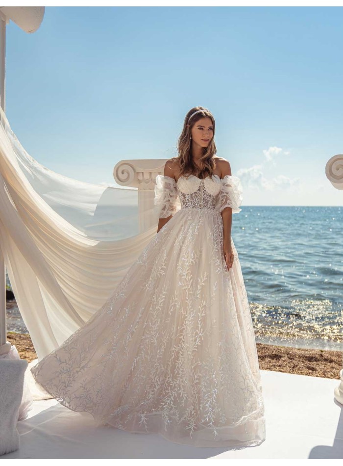 Evasée wedding dress with strapless neckline and open back in embroidered tulle at INVITADISIMA