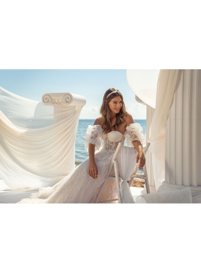 Evasée wedding dress with strapless neckline and open back in embroidered tulle by ANNIE VICTOR