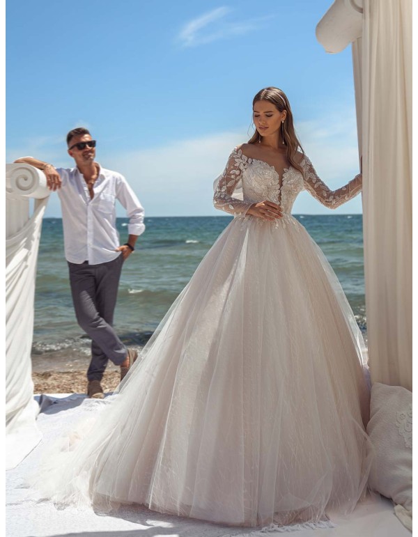 Princess wedding dress with beautiful embroidered bodice and tattoo effect long sleeves at INVITADISIMA