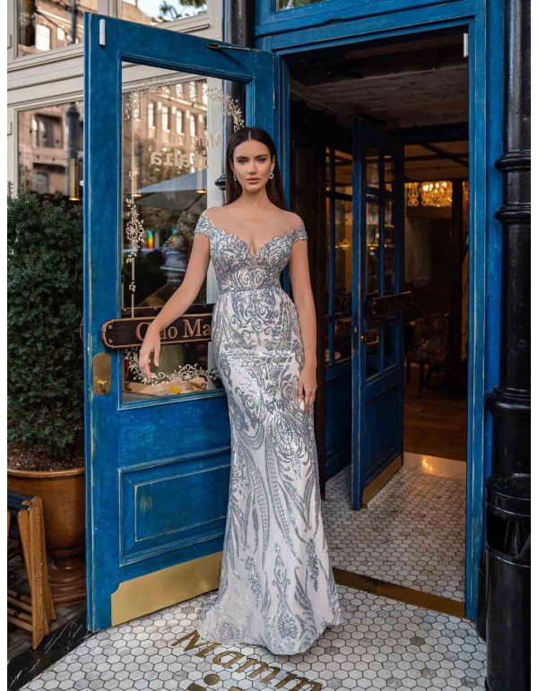 Long princess cut party dress with silver brocade and bandeau neckline.